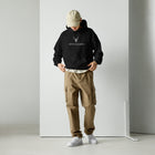Front view of the Embroidered Glen Etive Hoodie black colour worn by a male model 
