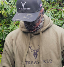 Man wearing the Embroidered Lomond Hoodie with British Flag in Military Green closeup view