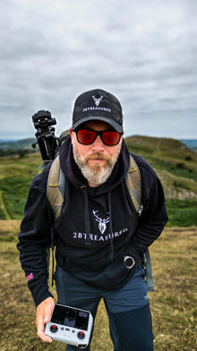 Embroidered Lomond Hoodie with British Flag worn by male model in the countryside front view