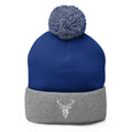Embroidered Pom Pom Classic Knit Beanie navy with grey stag logo front view