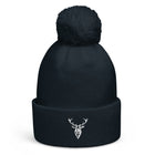 Embroidered Pom Pom Soft Beanie in navy with white stag branding front view