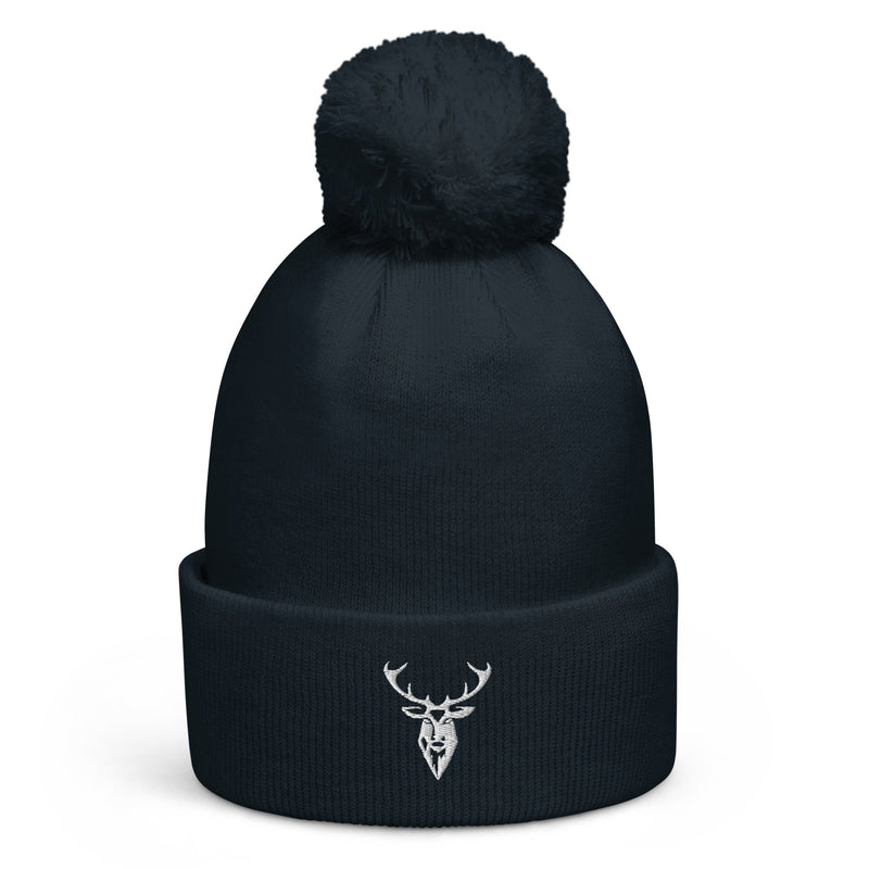 Embroidered Pom Pom Soft Beanie in navy with white stag branding front view