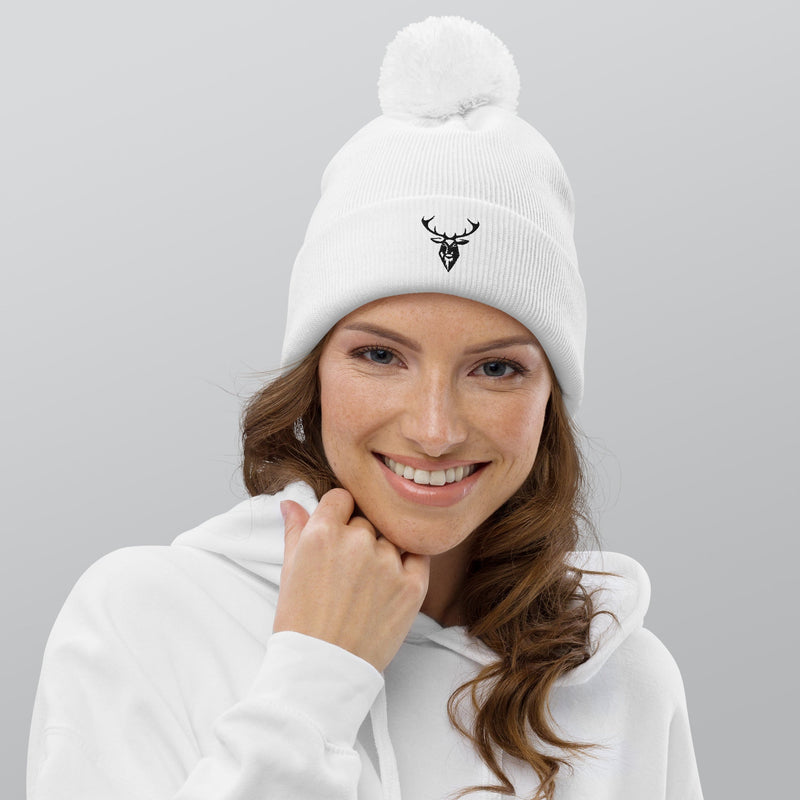 Female model wearing the Embroidered Pom Pom Soft Beanie in white front view