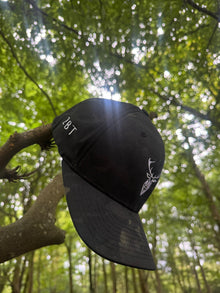 Embroidered Stag Structured Camo Cap, Multicam with British Flag on branch in forest