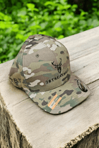 Embroidered Structured Camo Cap with British Flag, Multicam Green on a tree stump side view