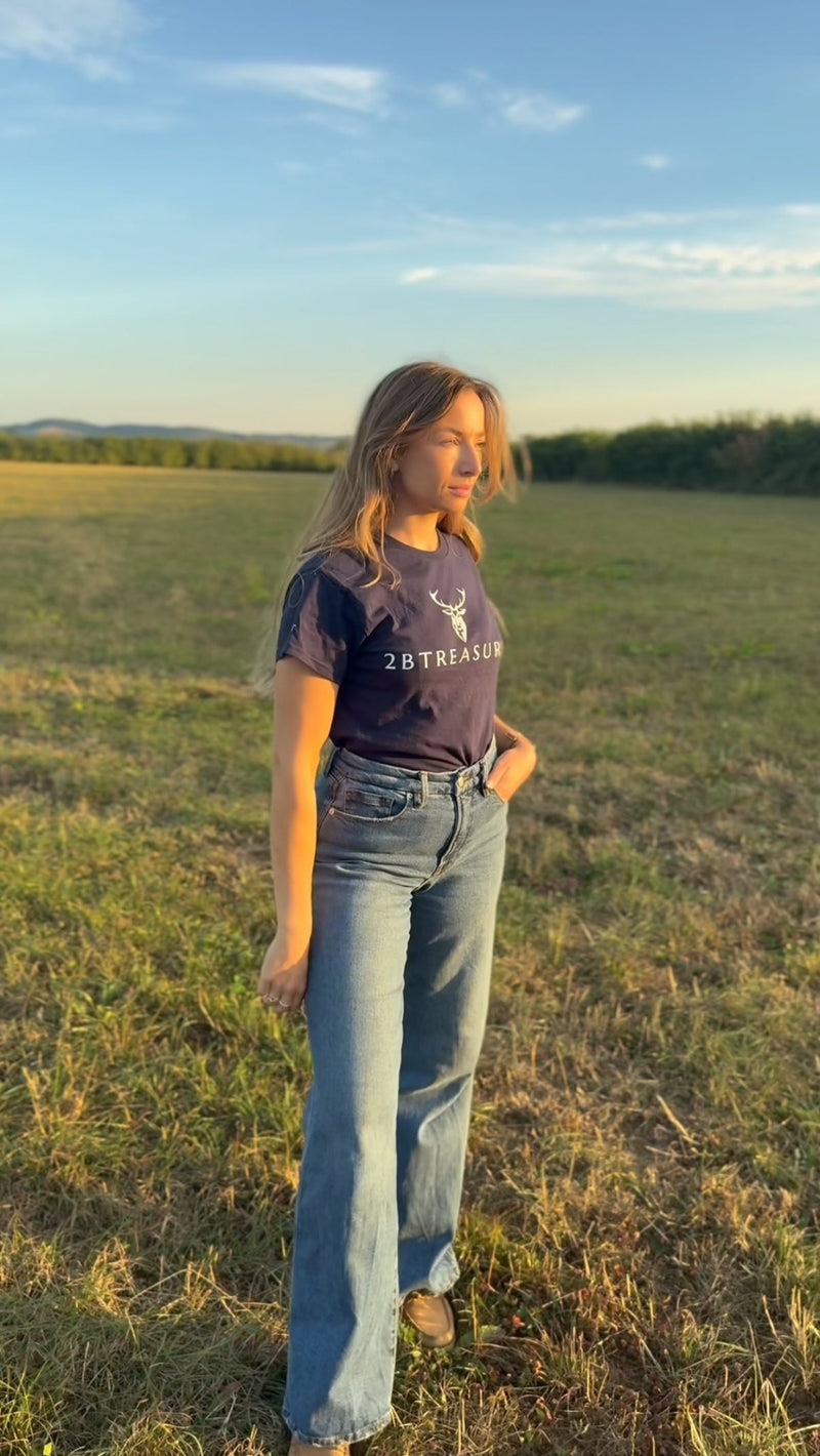 Woman model standing in field wearing thistle Tshirt from 2BTreasured